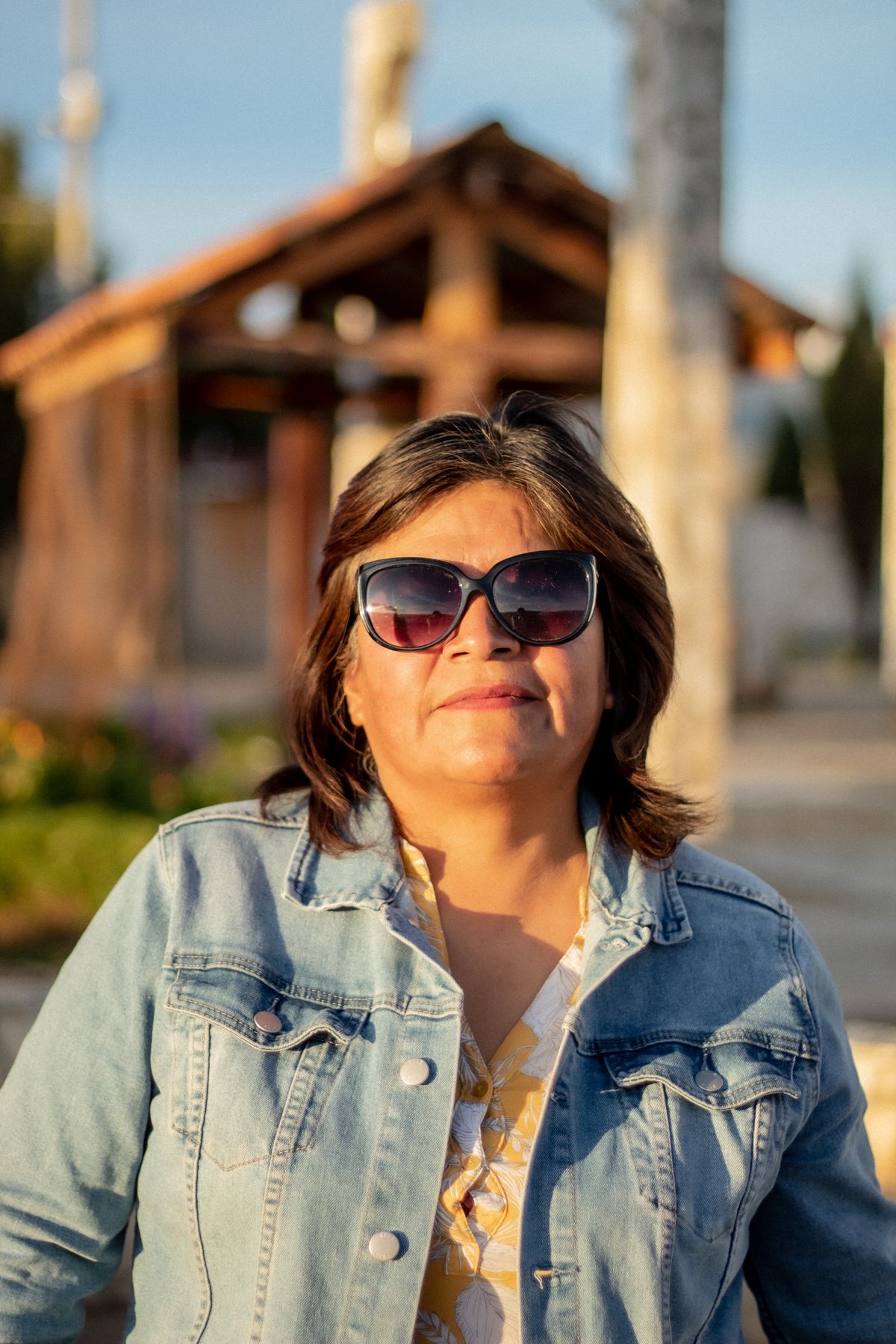 A confident woman in golden-hour light, representing Thrive's Life Systems area